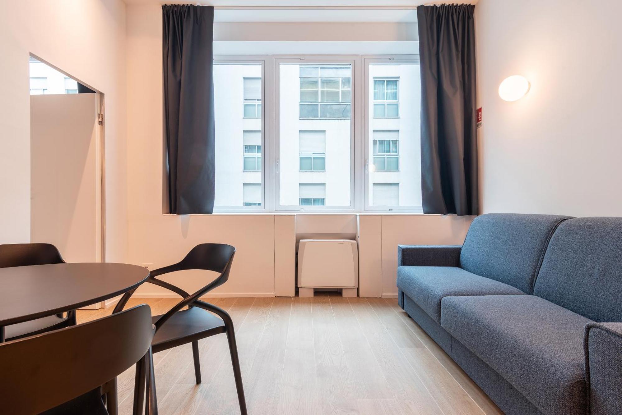 Easyhomes-City Centre Suites Milánó Szoba fotó